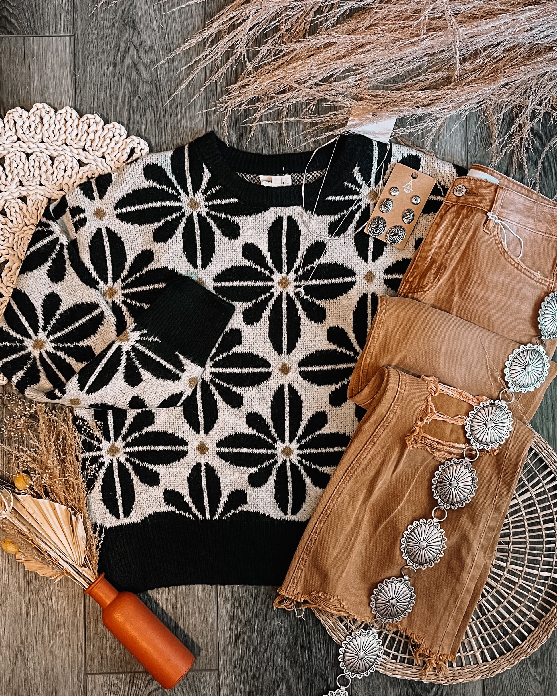Boho-inspired wild flower sweater with earthy tones and dusty vibes